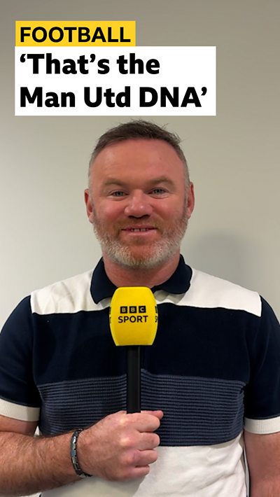 Wayne Rooney reacts to Manchester United's win in the Manchester derby