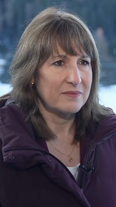 UK Chancellor Rachel Reeves wearing purple coat