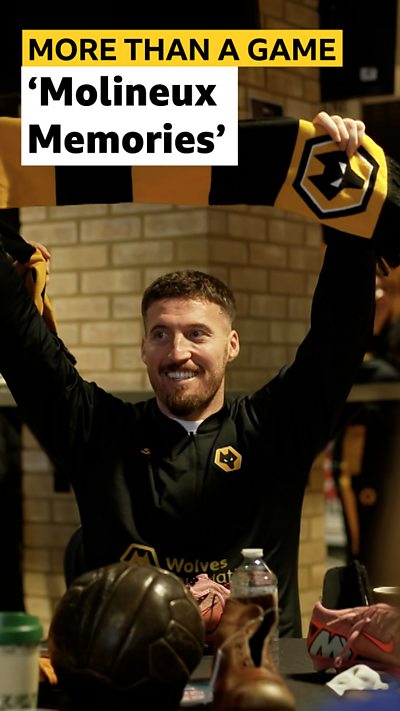 Wolves defender Matt Doherty holding a Wolves scarf