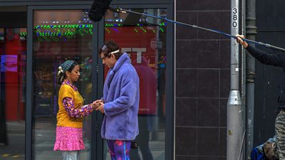 Filming actors Anjana Vasan (l) and Corey Mylchreest (r) on location in Weston-super-Mare (photo credit: Donna Lyons)