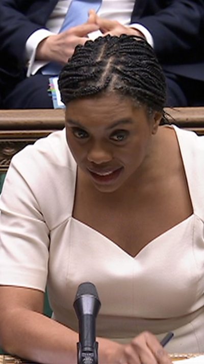 Kemi Badenoch stands in the House of Commons during PMQs
