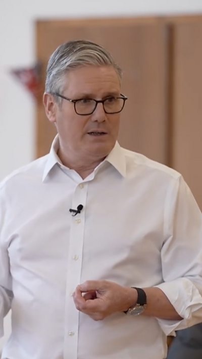 Keir Starmer in a crisp white shirt