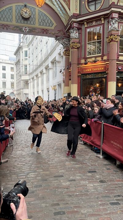 Pancakes flew as teams raced through Leadenhall Market for the Shrove Tuesday tradition.