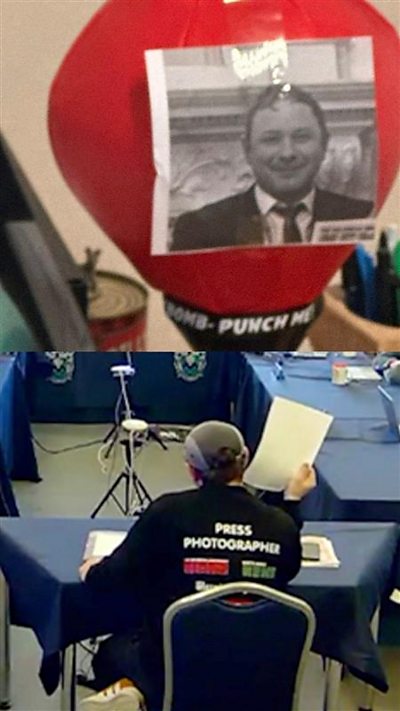Photo of reporter taped to punchbag in council office