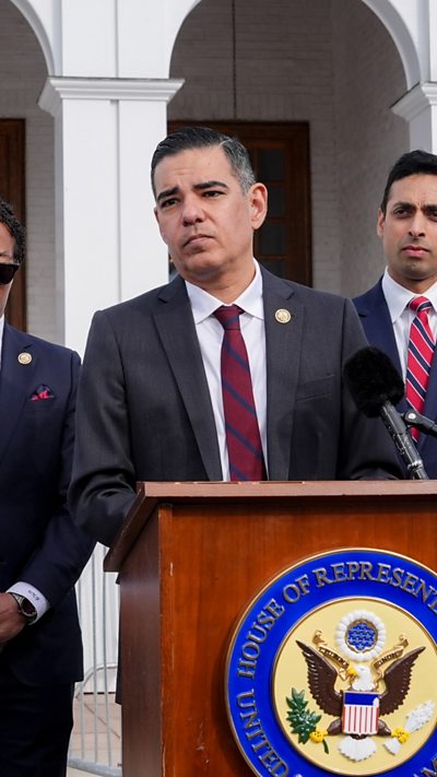 Robert Garcia is talking to reporters.