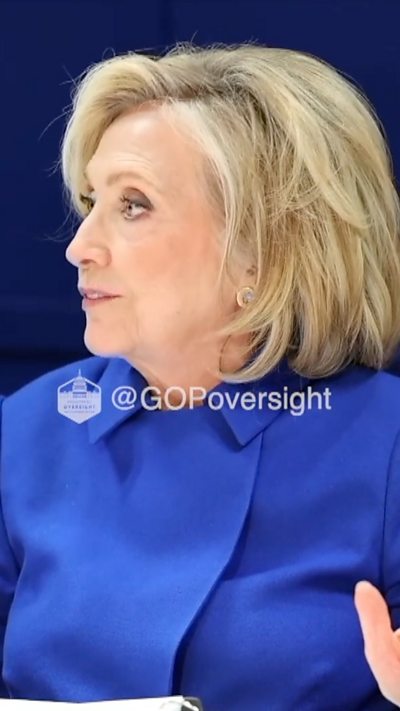 Hillary Clinton is pushing away from her desk.