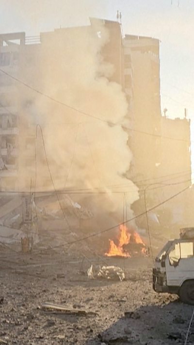 Fire and smoke seen on street in Beirut