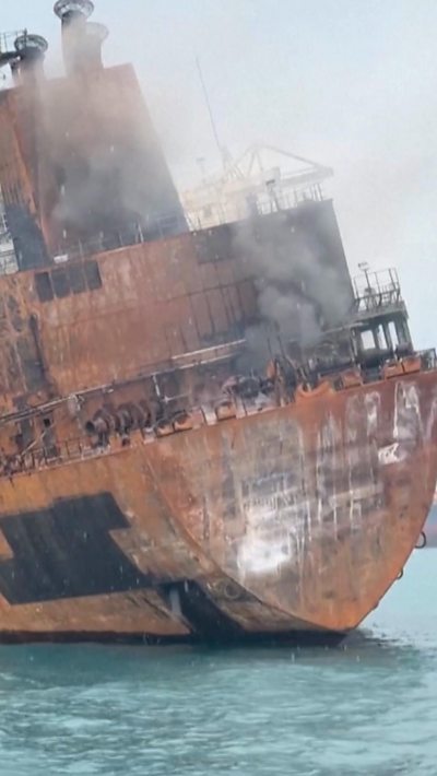 The smouldering back of a ship