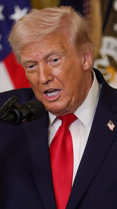 President Donald Trump speaks during a Women's History Month event.