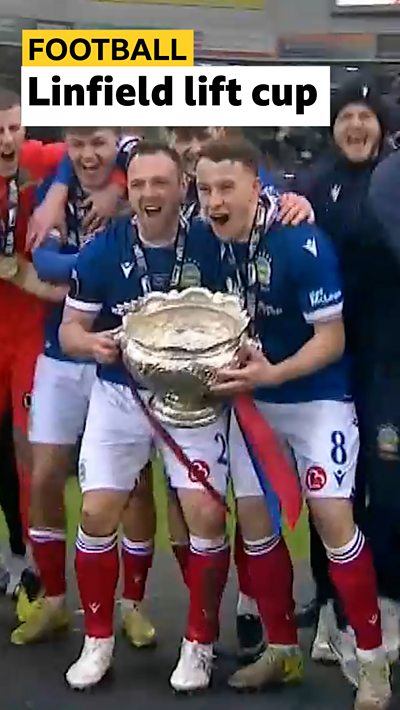Linfield lift the League Cup trophy