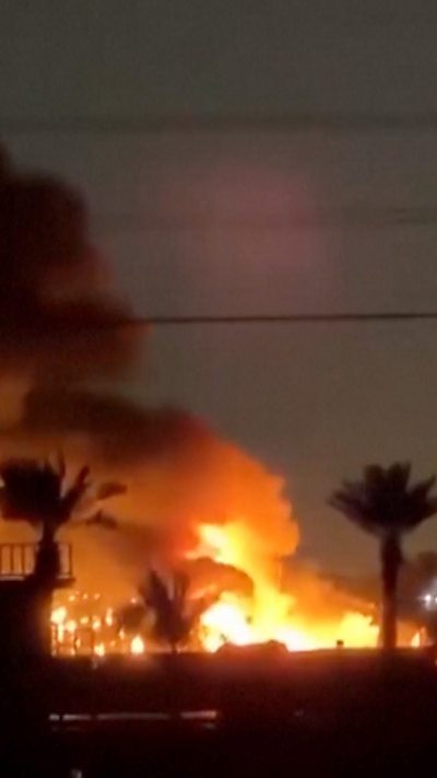 Orange flames and smoke at a facility