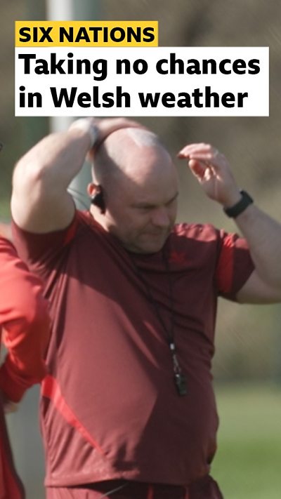 Sean Lynn applies suncream