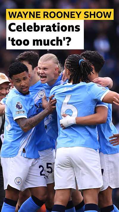 Manchester City players celebrate after their win against Arsenal