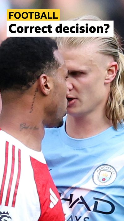 Gabriel of Arsenal clashes with Erling Haaland of Manchester City