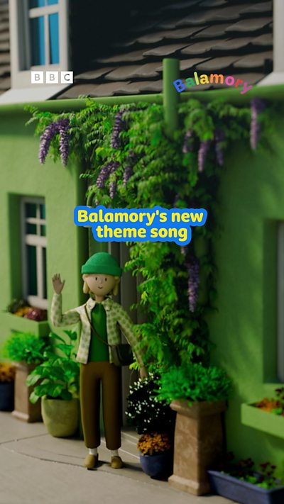 A animated woman wearing green clothes stands outside of a green house waving at the camera.