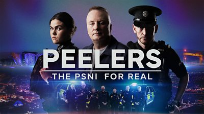 Two police officers in unifrom standing either side of stephen nolan. The words Peelers - The PSNI for real is in the middle of the image