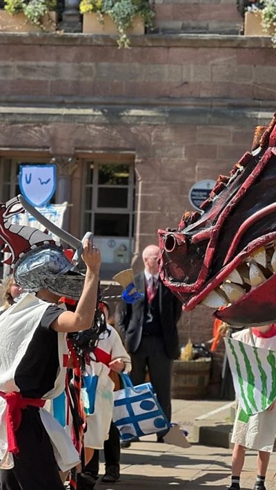 A colourful street performance brought St George's Day to life in Chester