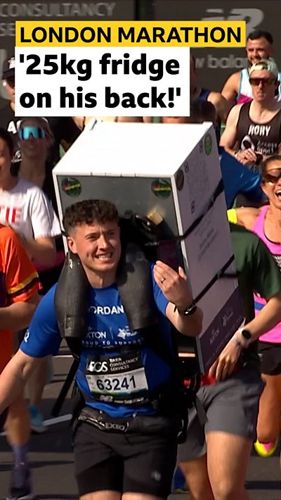 Jordan Adam of The FTD Brothers runs with fridge on his back