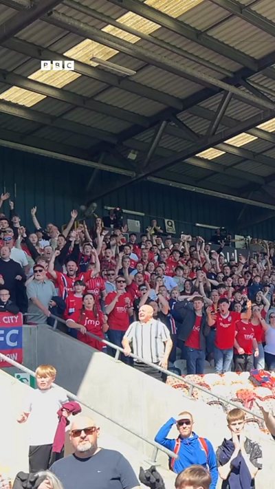 A shot of the York fans in the Rochdale stadium