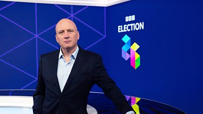 Martin Geissler wearing a suit in the BBC election studios