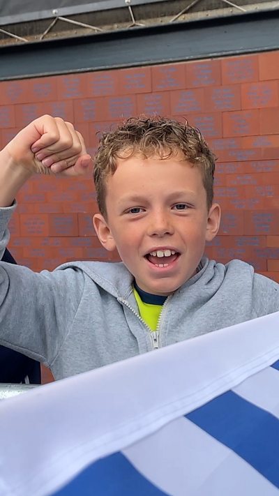 Boy cheers on Ipswich.