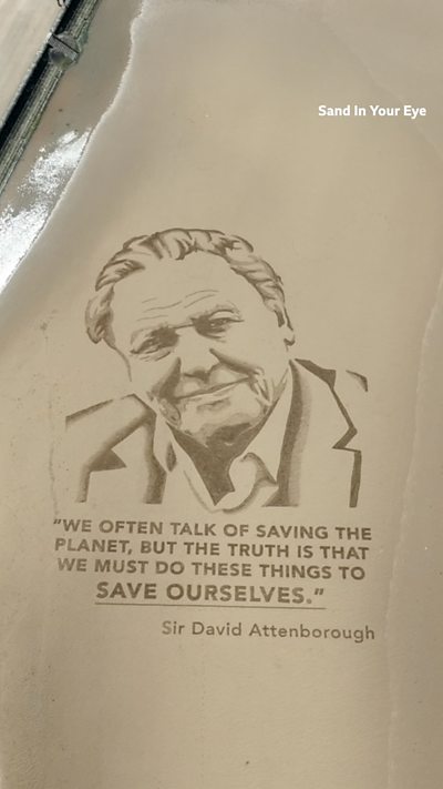 Image etched in sand