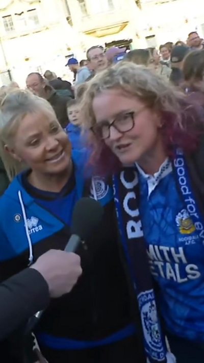 Two female Rochdale fans dressed in their blue club colours