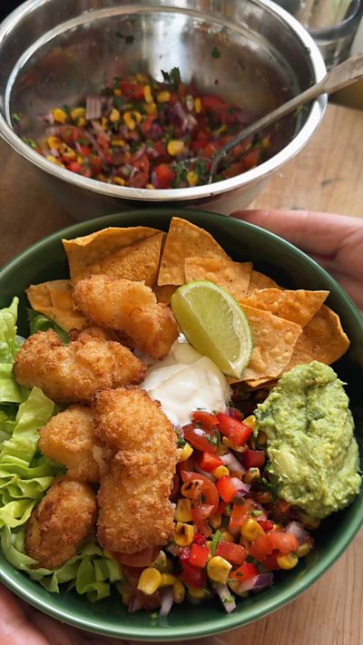 Scampi bowl with charred corn salsa