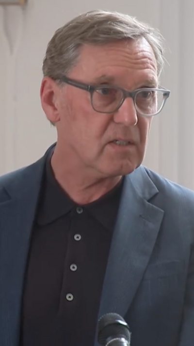 Alan Milburn during press conference