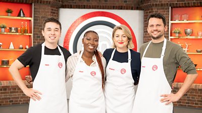 The four Masterchef finalists standing in aprons, in the studio smiling at the camera