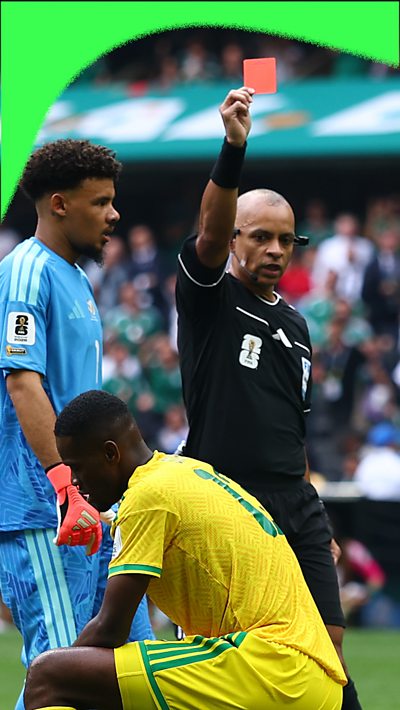 referee Wilton Sampaio issues a red card to Sphephelo Sithole