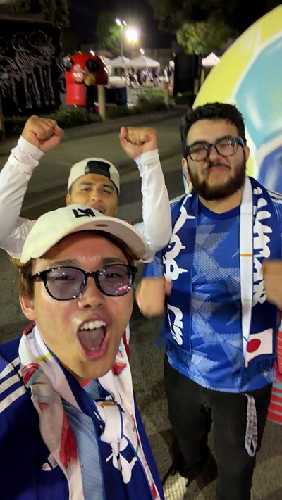 Japanese fans celebrate their 4-0 win over Tunisia