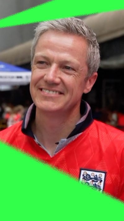 An England fan in Atlanta smiles to the camera