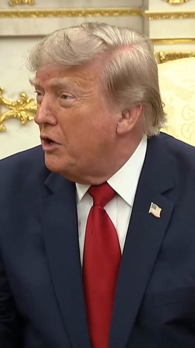 President Trump wears a red tie.