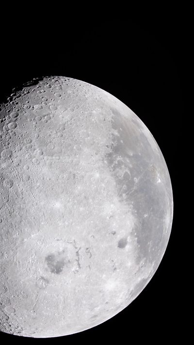 Detailed telescopic view of the Moon against a black sky