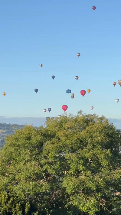 A shot of the balloons going over Bristol