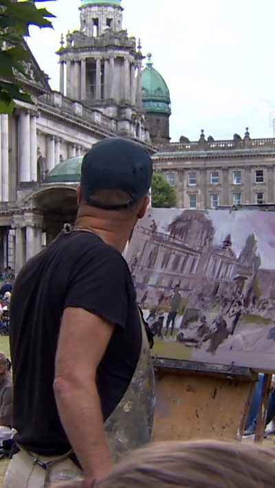 Oil paint artist captures Fleadh fever at Belfast City Hall grounds