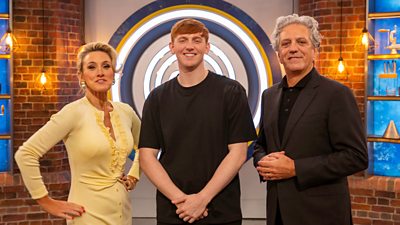 Morgan Burtwistle (AKA Angry Ginge) stands in the MasterChef kitchen with Grace Dent and Giorgio Locatelli.