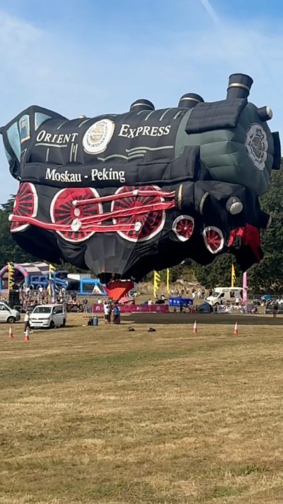 A large locomotive hot air balloon.