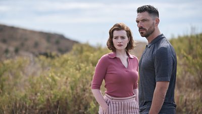 Scene from This City is Ours series 2. Diana Williams (Hannah Onslow) and Michael Kavanagh (James Nelson-Joyce) stand outdoors in a sunny field.