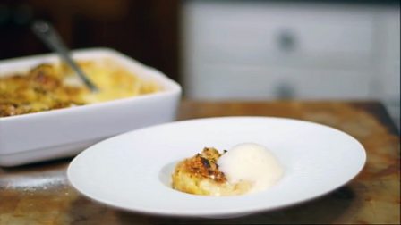 White chocolate and whisky bread and butter pudding with honeycomb foam and whisky ice cream