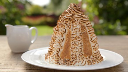 Baked Alaska with creamy chocolate sauce