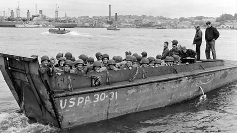 Photograph of soldiers aboard a higgins boat.