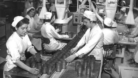 Women working in a food factory, preparing fro VE day. 