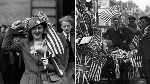 People wearing and holding US/ Great British flags and trinkets