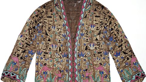 Ornate jacket featuring illustrations inspired by Ancient Egypt.