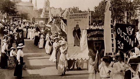 A photograph showing the National Union of Women's Suffrage Societies (NUWSS) on a march. 