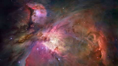 The Orion Nebula. A swirling cloud of gas and dust in space.