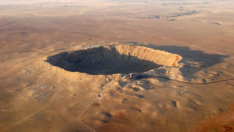 A giant meteor crater in the Arizona desert.