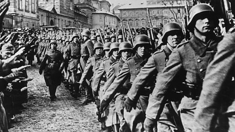 German troops march into Prague during the invasion of Czechoslovakia